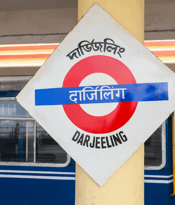 Scenic view of Darjeeling town with mountains and tea gardens