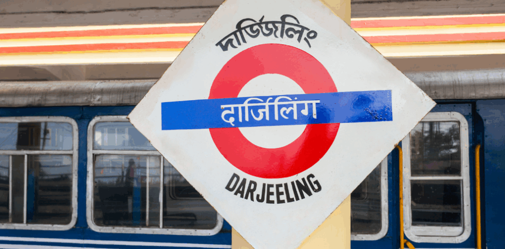 Scenic view of Darjeeling town with mountains and tea gardens