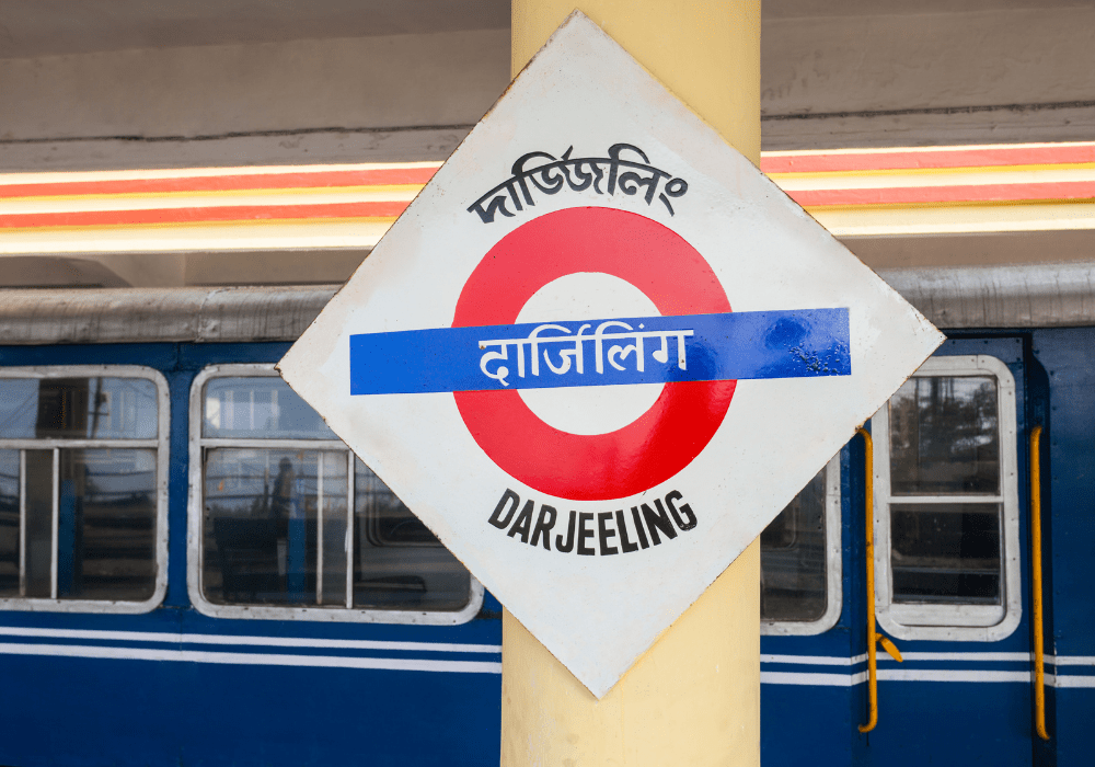 Scenic view of Darjeeling town with mountains and tea gardens