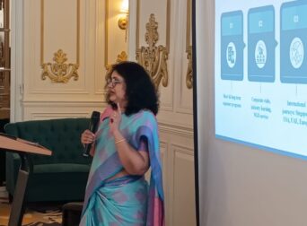 Founder conducting seminar on educational tours for school principals