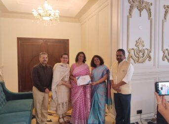 School principals receiving certificates for attending educational tour session