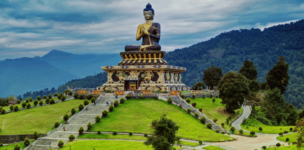 Scenic view of Gangtok and Darjeeling showcasing mountains and greenery