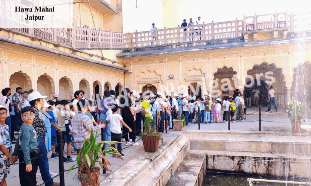 Students exploring Hawa Mahal in Jaipur during an educational tour highlighting architecture and royal heritage