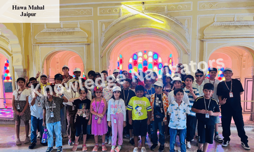 Students exploring Hawa Mahal in Jaipur during an educational tour highlighting architecture and royal heritage