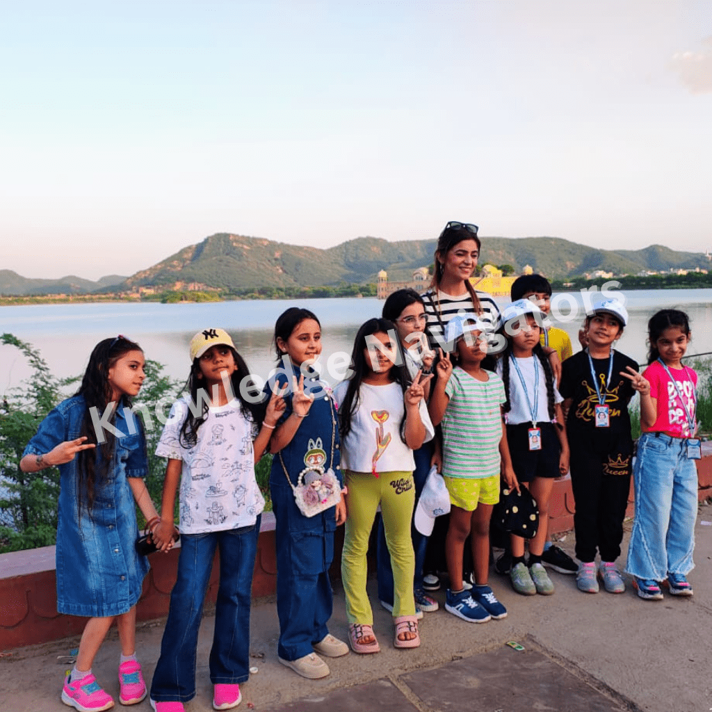 Students exploring Jal Mahal in Jaipur during an educational tour highlighting architecture and heritage