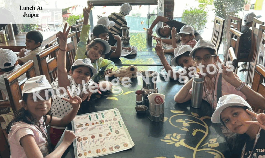 Students enjoying local cuisine during their educational trip in Jaipur
