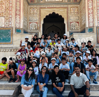 Students exploring Amber Fort during an educational tour highlighting history and architecture