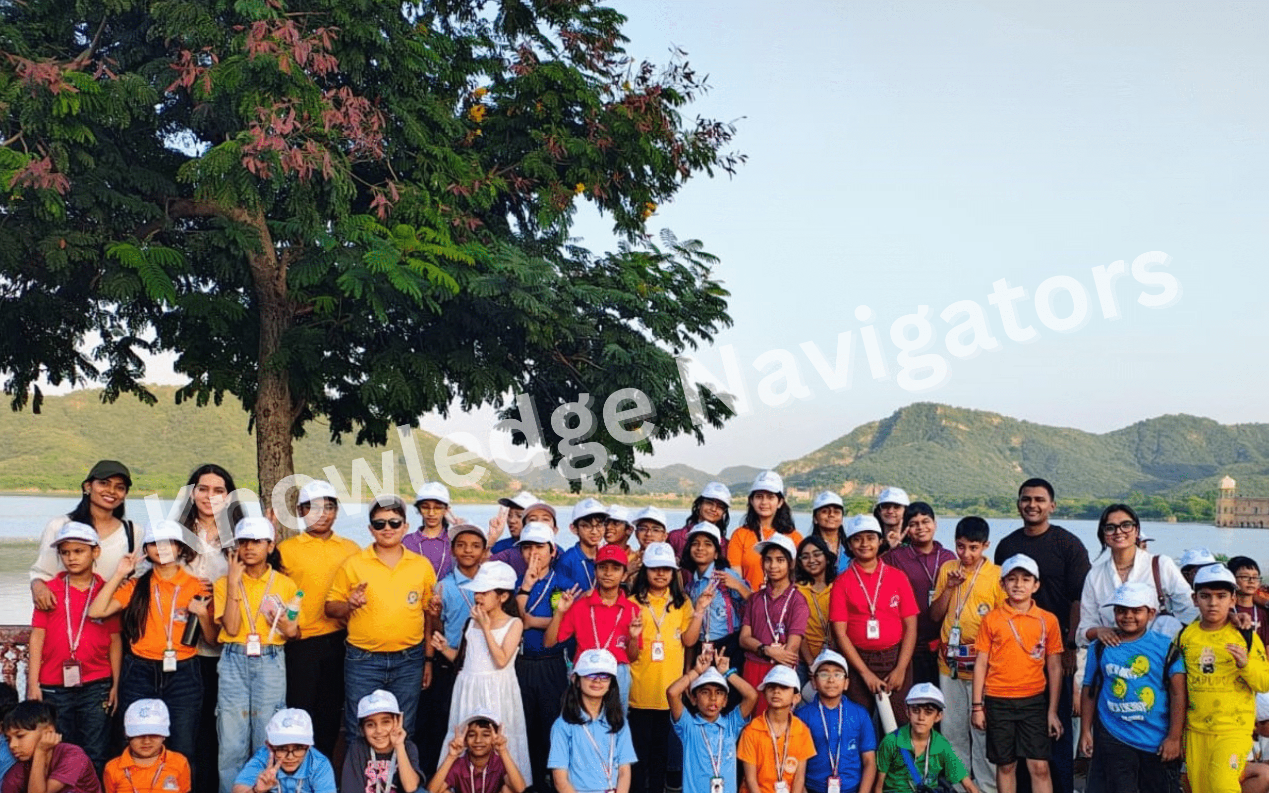 Students exploring Jal Mahal in Jaipur during an educational tour highlighting architecture and heritage